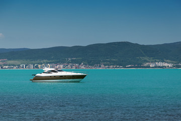 Fototapeta na wymiar Yacht in to the sea on the Bulgarian Black Sea coast in summer