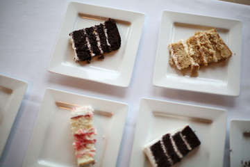 Slices of Different Flavors of Wedding Cake