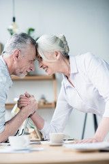 Fototapeta premium Business partners shaking hands at office