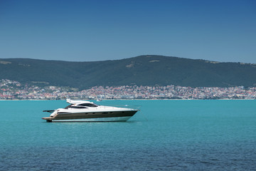 Fototapeta na wymiar Luxury yacht in to the sea in summer