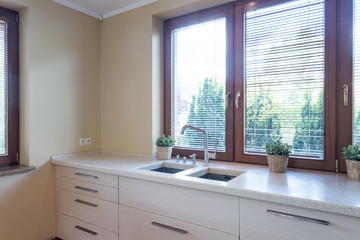 Kitchen with marble kitchentop with sink