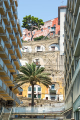 Contrast between modern and old residential buildings in Naples, Italy