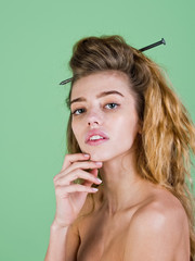 Obraz premium girl with building nail in long hair