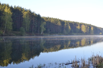 River early in the morning. Morning mist over the water