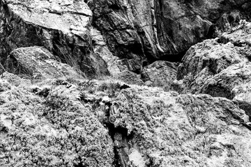 Wall fragment with scratches and cracks