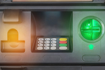 Fototapeta premium Close up ATM automatic teller machine on the wall 