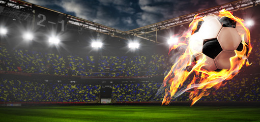 Soccer or football ball on fire at stadium