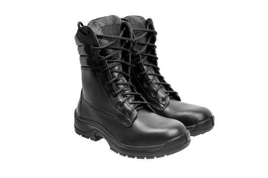 Black military leather boots isolated on white