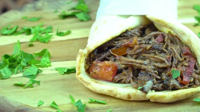 Turkish food lamb red meat wrapped, rotating