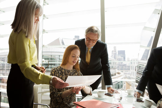 Business colleagues having meeting, London, UK