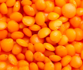 Red lentils as background. macro
