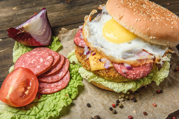 Hamburger with vegetables and egg