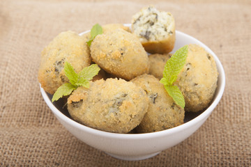 a handful of homemade croquettes of spinach