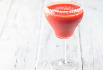 Glass of strawberry margarita cocktail