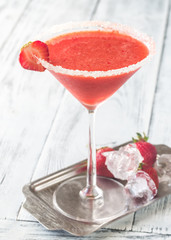 Glass of strawberry margarita cocktail