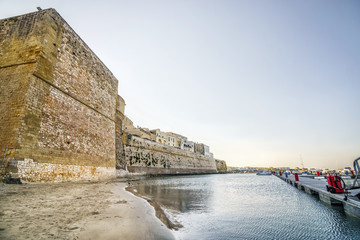 Aragonese castle and sandy beach in Otranto, Apulia, Italy