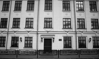 An old house on the embankment on a sunny day