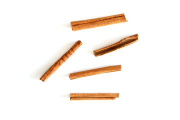 Top view of cinnamon stick isolated on white background