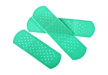 Colorful adhesive plasters on a white background