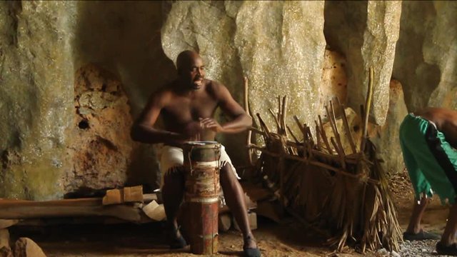 Man and Woman dance in cave, Cuba