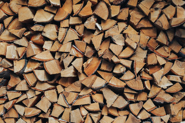 Firewood. Stack of wood logs, wooden abstract background