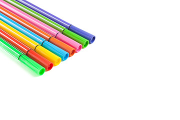Fototapeta premium Multicolored markers lie on paper. Drawing. Writing goods 