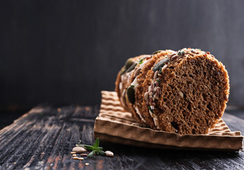 Sandwiches rye bread with cream cheese and mix seeds on a beige marble table  . Health snacks concept. Top view. Copy space.