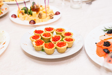 Tartlets with red caviar. Protein healthy food