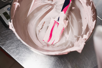 Blade in marshmallow mass lying in a container