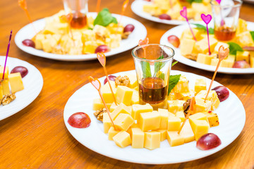 Cubes of yellow cheese