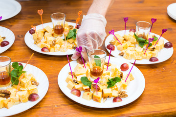 Close-up of chef cooking food kitchen restaurant cutting cook hands hotel man male knife preparation fresh preparing concept