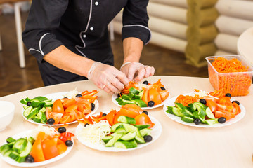 Close-up of chef cooking food kitchen restaurant cutting cook hands hotel man male knife preparation fresh preparing concept