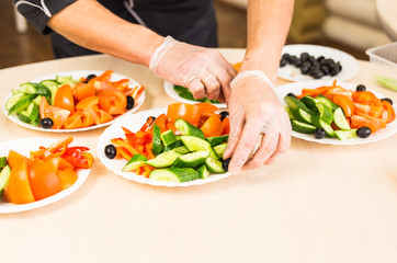 Close-up of chef cooking food kitchen restaurant cutting cook hands hotel man male knife preparation fresh preparing concept