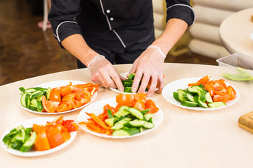 Close-up of chef cooking food kitchen restaurant cutting cook hands hotel man male knife preparation fresh preparing concept
