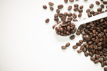 seed coffee and spoon on white background