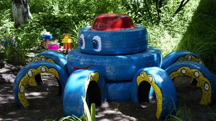 Fototapeta na wymiar Recycling: an octopus made of tires
