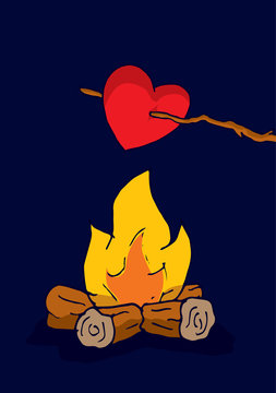 Heart slowly cooking in camp fire