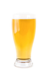 Glass of light filtered lager beer on white
