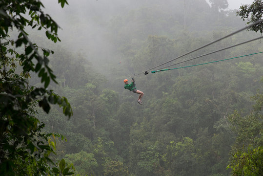 ziplining over the tropical trees