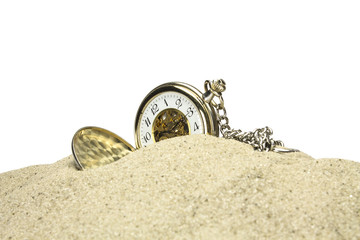 Pocket watch in sand