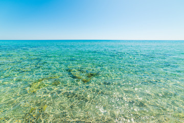 Turquoise water and clear sky in Costa Rei