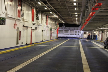 Car space inside of ferry boat - obrazy, fototapety, plakaty