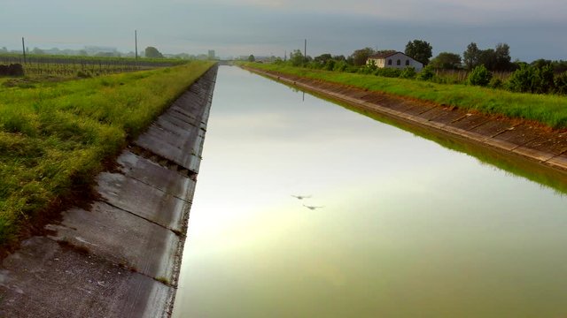 agricultural channel in Italian countryside