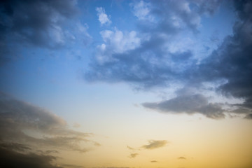 Fototapeta na wymiar Beautiful clouds at sunset after rain as background .