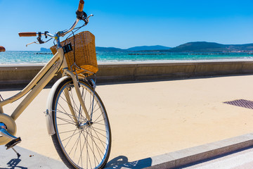 Fototapeta na wymiar Bicycle parked by the sea in Sardinia