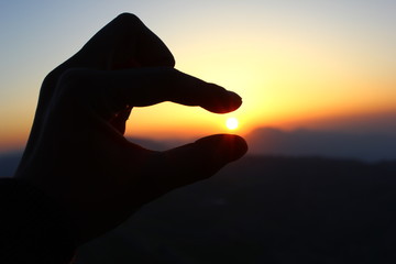 Sunrise in my hand