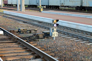 railway semaphore near the train arrow closeup