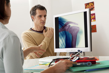 Models On screen, colorized x-ray of the shoulder (healthy)