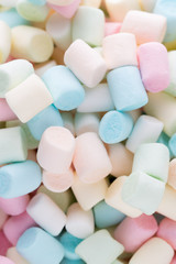 Background or texture of colorful mini marshmallows.