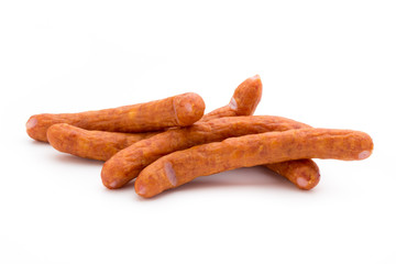 Stack of smoked sausages isolated on a white background.